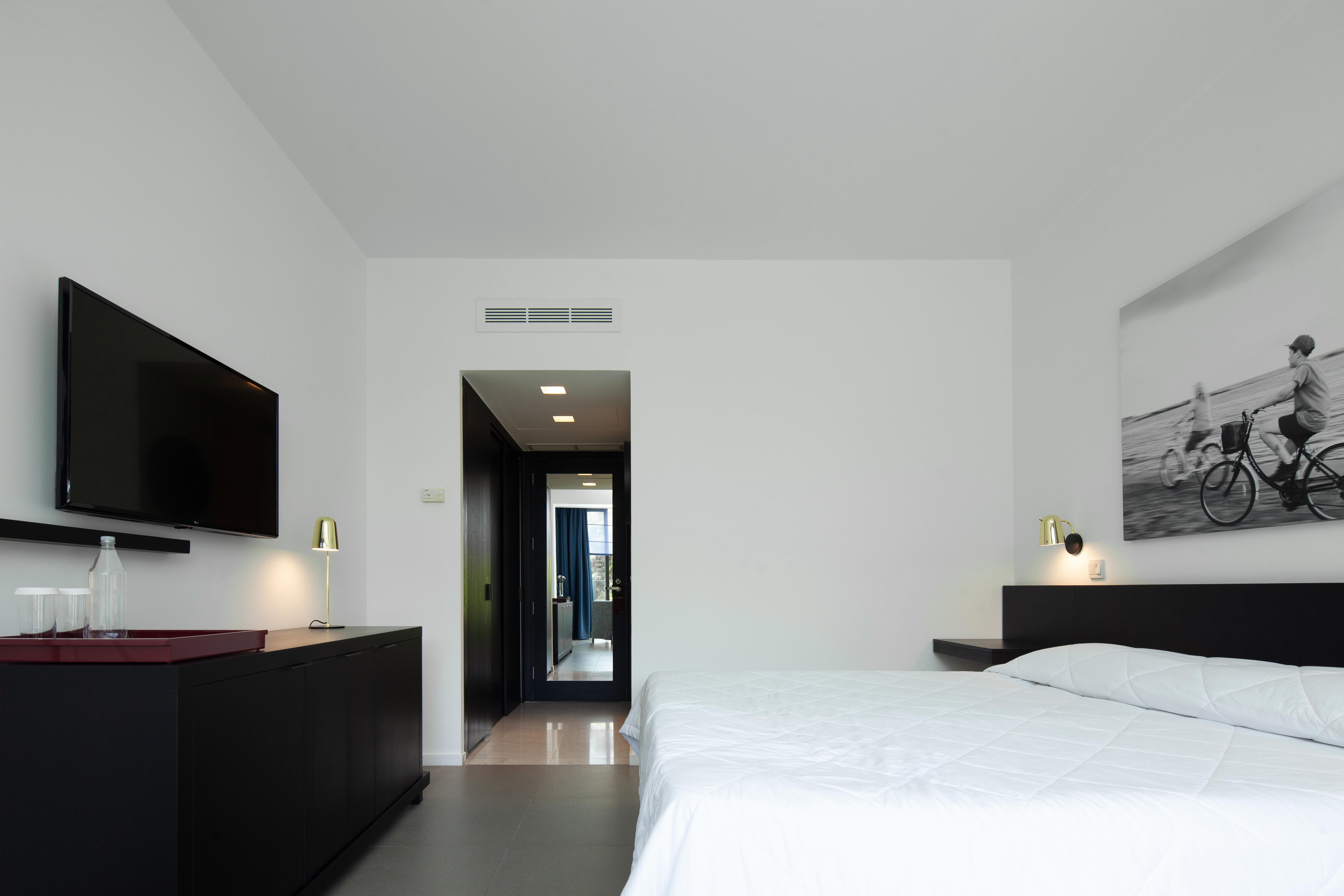 Almyra Hotel Paphos Kültér fotó A room at the hotel