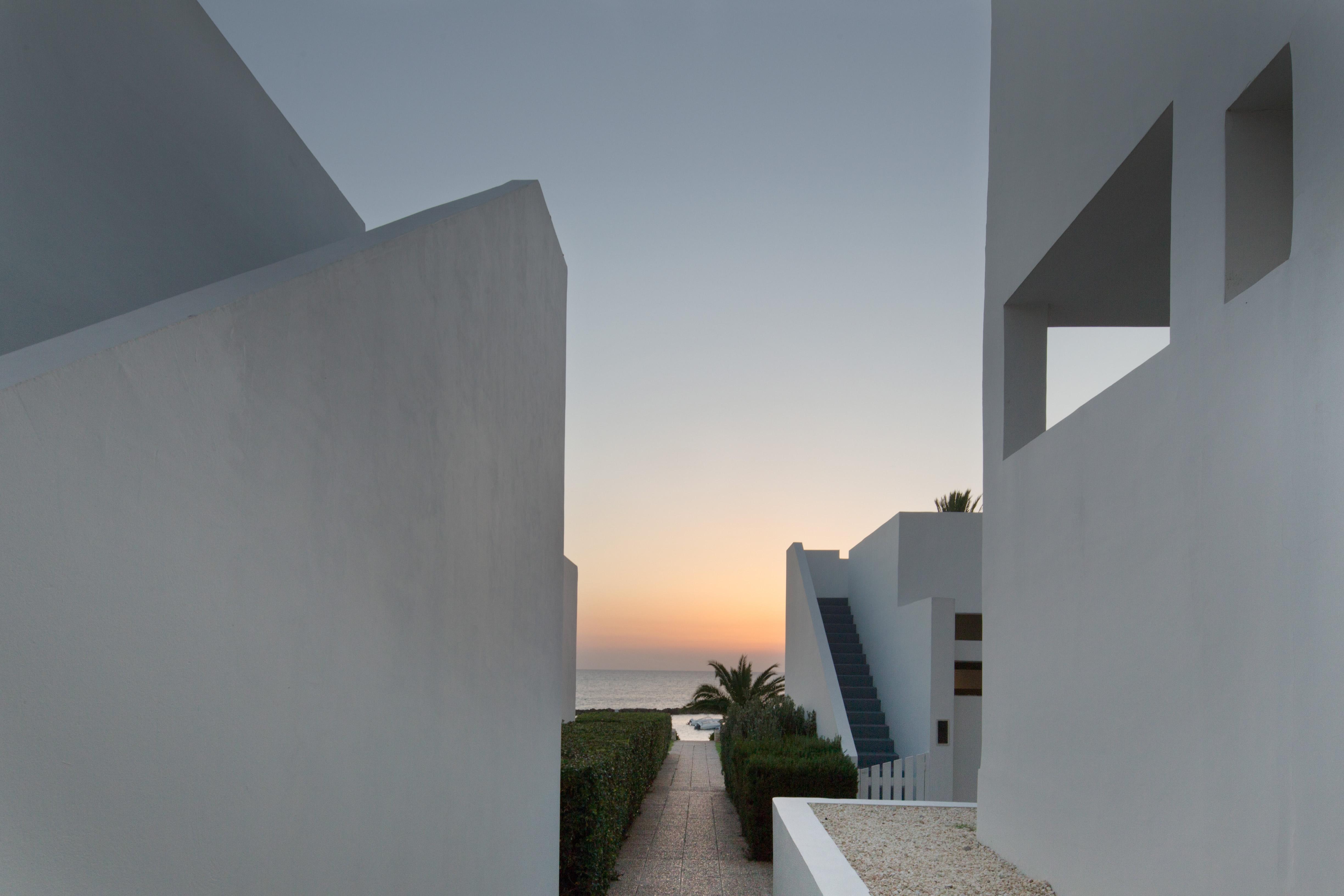 Almyra Hotel Paphos Kültér fotó The hotel at sunset