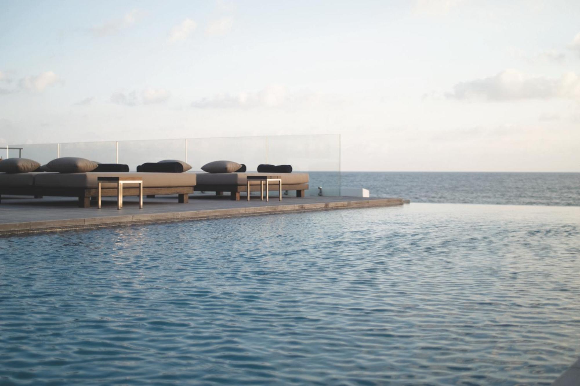 Almyra Hotel Paphos Kültér fotó The pool at the hotel